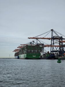 massive container ship docked at rotterdam port