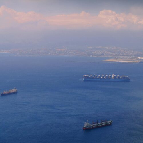 aerial shot of ship on body of water